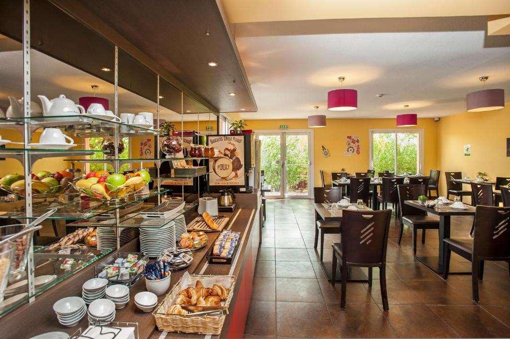 Bias  Brit Hotel Confort Villeneuve Sur Lot מסעדה תמונה